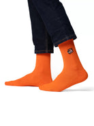 Tiger Orange crew čarape Good Willy – premium pamuk
Narandžaste crew čarape – detalj logotipa tigra
Tiger Orange čarape na nozi – lifestyle prikaz
Premium narandžaste čarape – close up teksture
Carape na nozi narandzaste