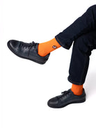 Tiger Orange crew čarape Good Willy – premium pamuk
Narandžaste crew čarape – detalj logotipa tigra
Tiger Orange čarape na nozi – lifestyle prikaz
Premium narandžaste čarape – close up teksture
Carape na nozi narandzaste