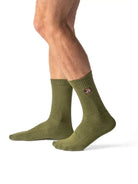 Olive crew čarape Good Willy – maslinasto zelene premium
Maslinasto zelene čarape – detalj logotipa tigra
Tuscany Olive čarape na nozi – lifestyle prikaz
Olive premium čarape – close up teksture
Sportske carape